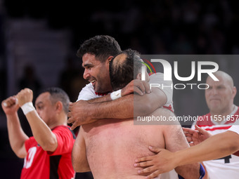 Athletes of Team Egypt celebrate after winning the Men's Sitting Volleyball Bronze Medal Match on day nine of the Paris 2024 Summer Paralymp...