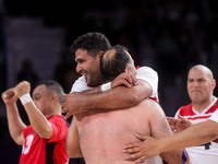 Athletes of Team Egypt celebrate after winning the Men's Sitting Volleyball Bronze Medal Match on day nine of the Paris 2024 Summer Paralymp...