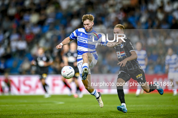 De Graafschap player Arjen van der Heide and FC Eindhoven player Hugo Deenen during the match De Graafschap vs. Eindhoven at Stadium De Vijv...