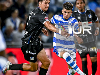 FC Eindhoven player Dyon Dorenbosch and De Graafschap player Ibrahim El Kadiri during the match between De Graafschap and Eindhoven at Stadi...