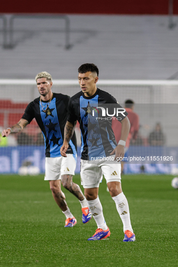 Lisandro Martinez of Argentina warms up before the FIFA World Cup 2026 Qualifier match between Argentina and Chile at Estadio Mas Monumental...