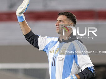 Emiliano Martinez of Argentina warms up before the FIFA World Cup 2026 Qualifier match between Argentina and Chile at Estadio Mas Monumental...