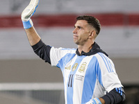 Emiliano Martinez of Argentina warms up before the FIFA World Cup 2026 Qualifier match between Argentina and Chile at Estadio Mas Monumental...