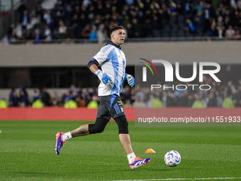 Emiliano Martinez of Argentina warms up before the FIFA World Cup 2026 Qualifier match between Argentina and Chile at Estadio Mas Monumental...