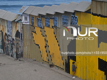 A new interactive mural of deported veterans, ''The Deported Veterans Diaspora,'' is at the Playas de Tijuana beach border wall on the Tijua...