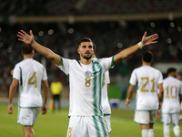 Houssem Eddine Aouar of Algeria celebrates after scoring a goal during the football match for the qualification of the African Cup of Nation...