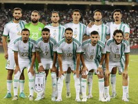 Algerian starters pose for a group photo before the football match of the qualification of the African Cup of Nations (CAN 2025) between Alg...