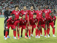 Equatorial Guinea's players pose for a group photo before the African Cup of Nations (AFCON 2025) qualifying football match between Algeria...