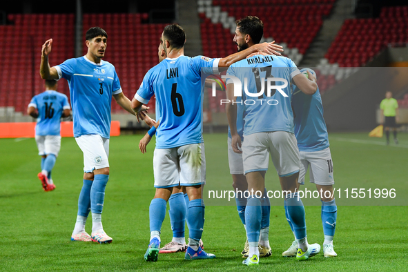 Israeli team members celebrate after scoring during the Belgium vs Israel match on matchday 1 of the UEFA Nations League 2024-2025, in Debre...