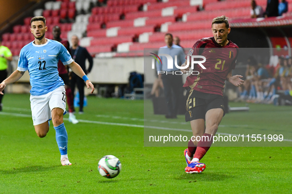 Timothy Castagne and Denny Gropper are in action during Belgium vs. Israel: matchday 1 of UEFA Nations League 2024-2025, at Nagyerdei Stadio...