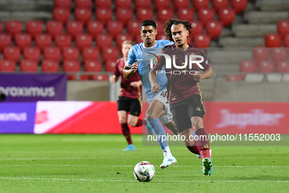 Arthur Theate and Anan Khalaili are in action during Belgium vs. Israel: matchday 1 of UEFA Nations League 2024-2025, in Debrecen, Hungary,...