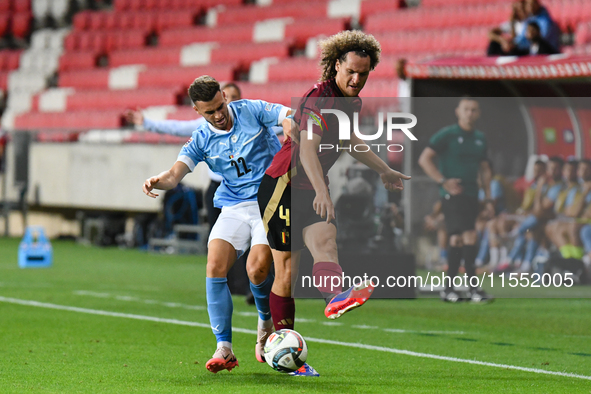 Denny Gropper and Wout Faes are in action during Belgium vs Israel: matchday 1 of UEFA Nations League 2024-2025, at Nagyerdei Stadion in Deb...