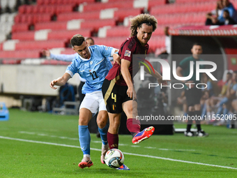 Denny Gropper and Wout Faes are in action during Belgium vs Israel: matchday 1 of UEFA Nations League 2024-2025, at Nagyerdei Stadion in Deb...