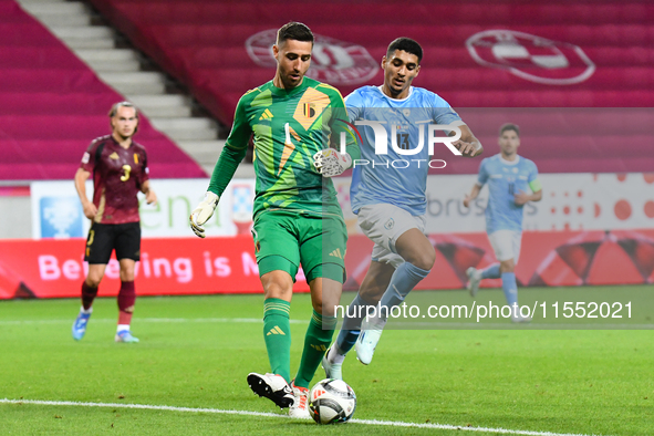 Koen Casteels and Anan Khalaili are in action during Belgium vs Israel: matchday 1 of UEFA Nations League 2024-2025, in Debrecen, Hungary, o...