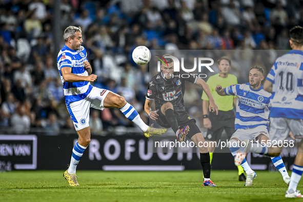 De Graafschap player Ralf Seuntjens and FC Eindhoven player Daan Huisman during the match De Graafschap vs. Eindhoven at Stadium De Vijverbe...