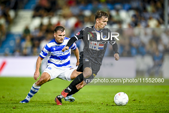 De Graafschap player Levi Schoppema and FC Eindhoven player Sven Blummel during the match De Graafschap vs. Eindhoven at Stadium De Vijverbe...