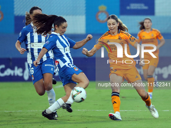 Melanie Leupolz and Julia Guerra play during the match between RCD Espanyol Women and Real Madrid CF Women, corresponding to week 1 of the L...