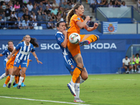 Melanie Leupolz and Julia Guerra play during the match between RCD Espanyol Women and Real Madrid CF Women, corresponding to week 1 of the L...