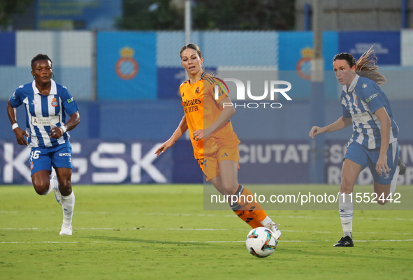 Amanda Mbadi, Mar Torras, and Melanie Leupolz play during the match between RCD Espanyol Women and Real Madrid CF Women, corresponding to we...