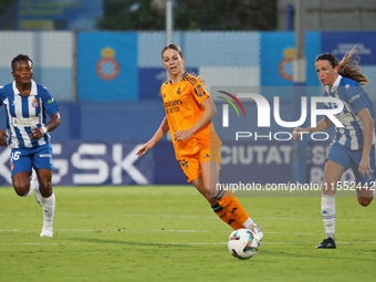 Amanda Mbadi, Mar Torras, and Melanie Leupolz play during the match between RCD Espanyol Women and Real Madrid CF Women, corresponding to we...