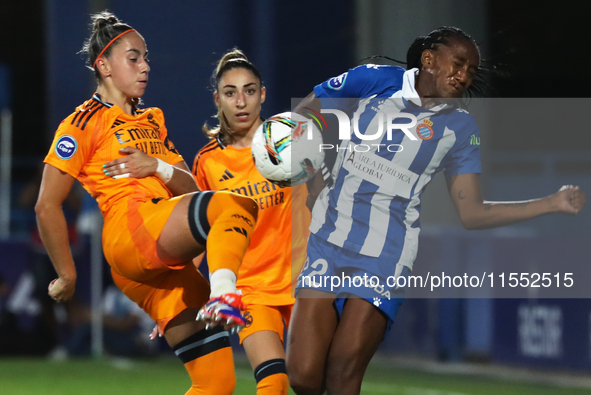 Daniela Caracas, Olga Carmona, and Athenea del Castillo play during the match between RCD Espanyol Women and Real Madrid CF Women, correspon...