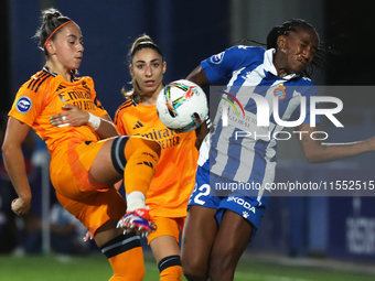 Daniela Caracas, Olga Carmona, and Athenea del Castillo play during the match between RCD Espanyol Women and Real Madrid CF Women, correspon...