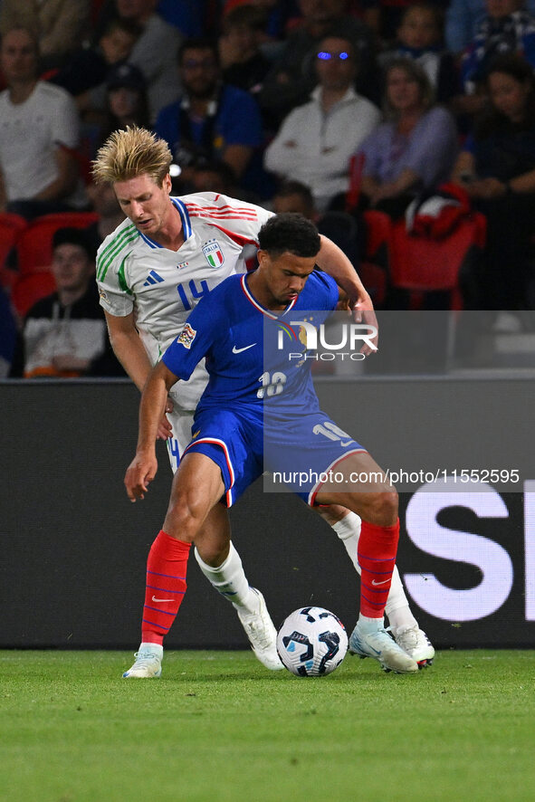 Marco Brescianini (ITA) and Warren Zaire-Emery (FRA) during the UEFA National League Matchday 1 match between France and Italy at the Parc d...