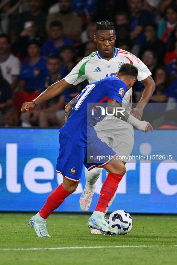 Destiny Udogie (ITA) and Jonathan Clauss (FRA) during the UEFA National League Matchday 1 match between France and Italy at the Parc des Pri...