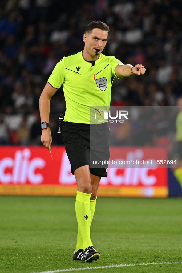 Referee Sandro Scharer (SUI) officiates the UEFA National League Matchday 1 match between France and Italy at the Parc des Princes Stadium i...