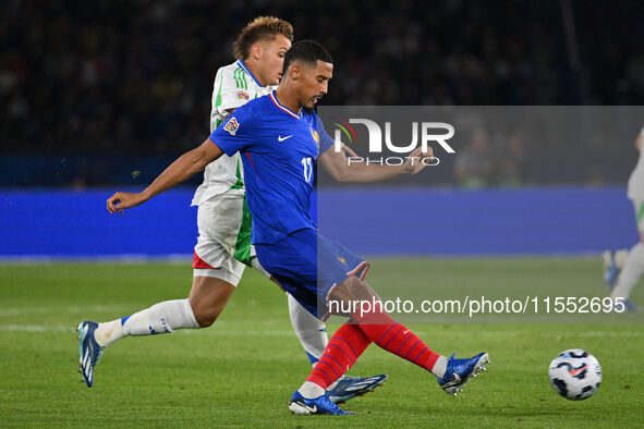 Mateo Retegui (ITA) and William Saliba (FRA) during the UEFA National League Matchday 1 match between France and Italy at the Parc des Princ...