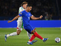 Mateo Retegui (ITA) and William Saliba (FRA) during the UEFA National League Matchday 1 match between France and Italy at the Parc des Princ...