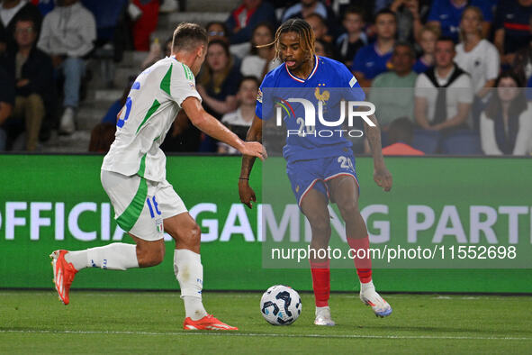 Davide Frattesi (ITA) and Bradley Barcola (FRA) during the UEFA National League Matchday 1 match between France and Italy at the Parc des Pr...