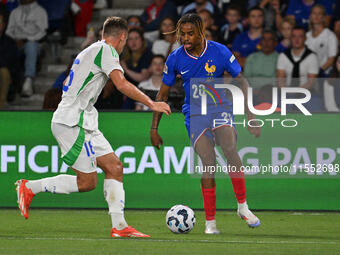 Davide Frattesi (ITA) and Bradley Barcola (FRA) during the UEFA National League Matchday 1 match between France and Italy at the Parc des Pr...