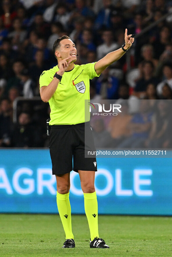 Referee Sandro Scharer (SUI) officiates the UEFA National League Matchday 1 match between France and Italy at the Parc des Princes Stadium i...