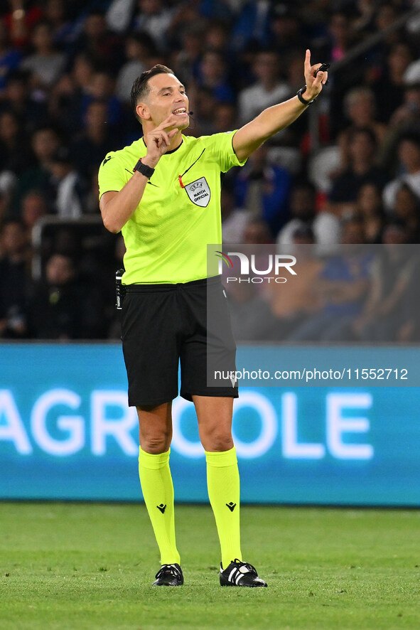 Referee Sandro Scharer (SUI) officiates the UEFA National League Matchday 1 match between France and Italy at the Parc des Princes Stadium i...