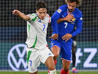 Samuele Ricci (ITA) and Antoine Griezmann (FRA) during the UEFA National League Matchday 1 match between France and Italy at the Parc des Pr...