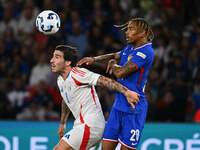 Sandro Tonali (ITA) and Bradley Barcola (FRA) during the UEFA National League Matchday 1 match between France and Italy at the Parc des Prin...