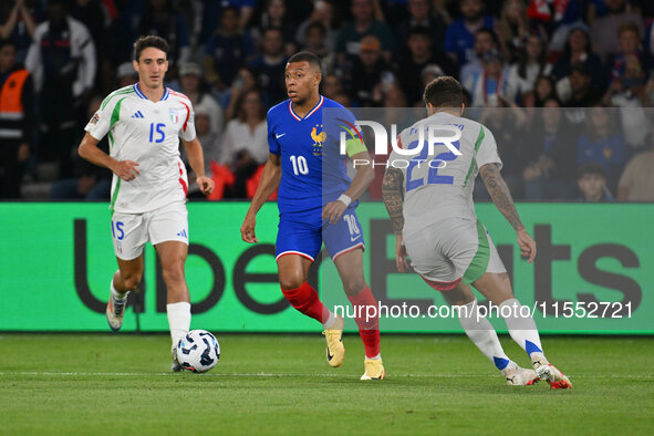 Andrea Cambiaso (ITA) and Kylian Mbappe (FRA) during the UEFA National League Matchday 1 match between France and Italy at the Parc des Prin...