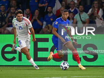 Andrea Cambiaso (ITA) and Kylian Mbappe (FRA) during the UEFA National League Matchday 1 match between France and Italy at the Parc des Prin...