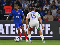 Bradley Barcola (FRA) and Andrea Cambiaso (ITA) during the UEFA National League Matchday 1 match between France and Italy at the Parc des Pr...