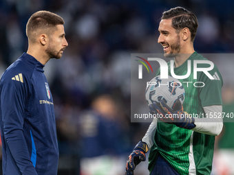 Guglielmo Vicario and Alex Meret of Italy warm up before the UEFA Nations League 2024/25 League A Group A2 match between France and Italy at...