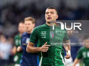 Alessandro Buongiorno of Italy warms up before the UEFA Nations League 2024/25 League A Group A2 match between France and Italy at Parc des...