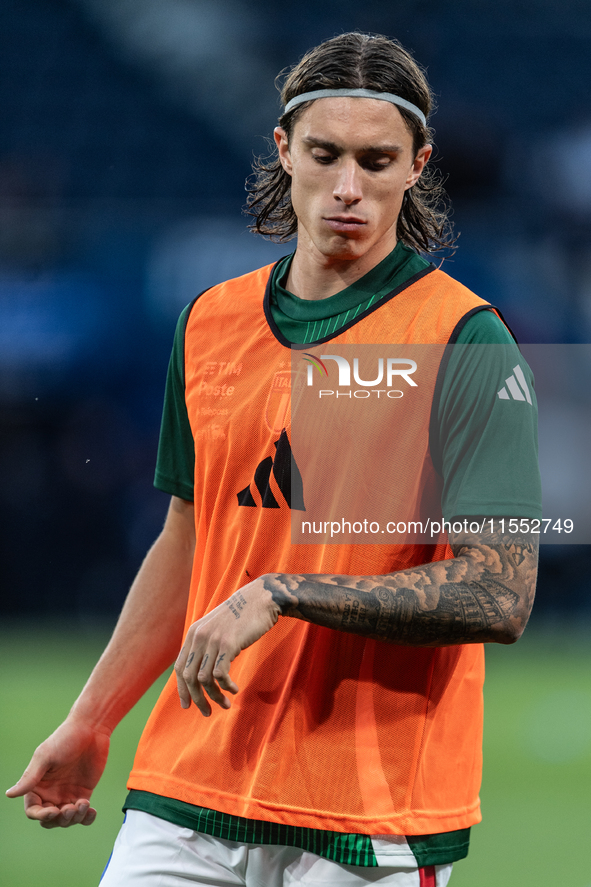 Riccardo Calafiori of Italy warms up before the UEFA Nations League 2024/25 League A Group A2 match between France and Italy at Parc des Pri...