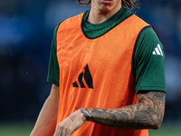 Riccardo Calafiori of Italy warms up before the UEFA Nations League 2024/25 League A Group A2 match between France and Italy at Parc des Pri...