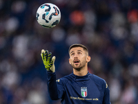 Guglielmo Vicario of Italy warms up before the UEFA Nations League 2024/25 League A Group A2 match between France and Italy at Parc des Prin...