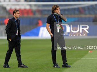 Nicolo Fagioli and Riccardo Calafiori of Italy inspect the pitch before the UEFA Nations League 2024/25 League A Group A2 match between Fran...