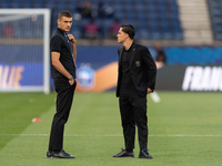 Alessandro Buongiorni and Giacomo Raspadori of Italy inspect the pitch before the UEFA Nations League 2024/25 League A Group A2 match betwee...