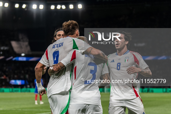 Federico Dimarco of Italy celebrates a goal with his teammates during the UEFA Nations League 2024/25 League A Group A2 match between France...