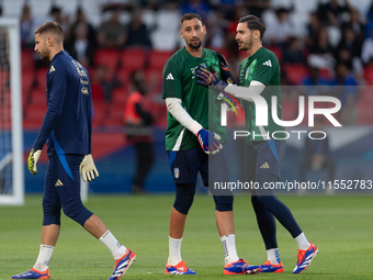 Guglielmo Vicario and Alex Meret of Italy warm up before the UEFA Nations League 2024/25 League A Group A2 match between France and Italy at...