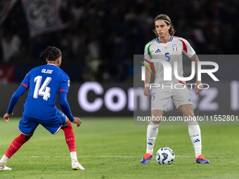 Riccardo Calafiori of Italy is in action during the UEFA Nations League 2024/25 League A Group A2 match between France and Italy at Parc des...